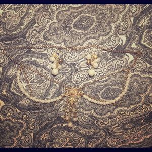 Headpiece with matching earrings.